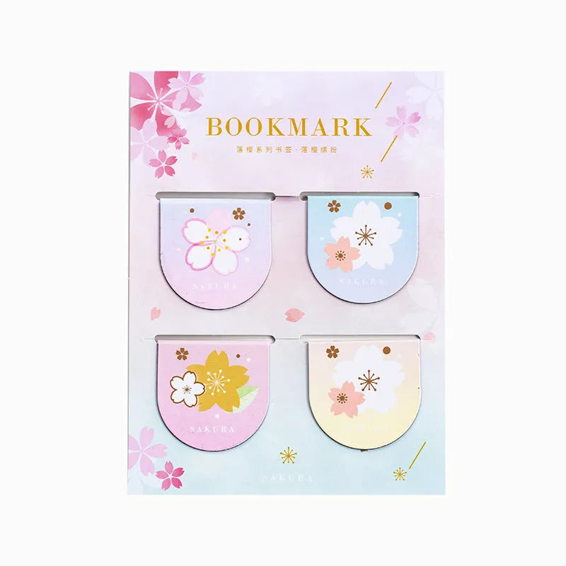 Set of four Yanji magnetic bookmarks with different cherry blossom designs on stone paper.