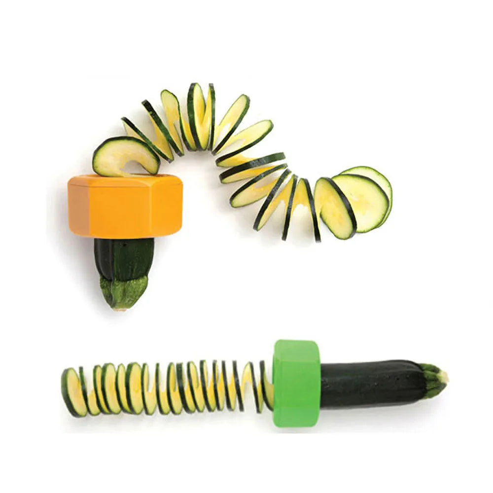 Yellow and green spiral knife vegetable cutter made of plastic on a kitchen worktop.