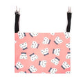 Double-sided lambskin cat hammock nest hanging in a cat cage with beige cat print pattern