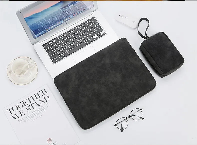 Flat black PU leather laptop bag liner with a soft handle and zipper for tablet protection.