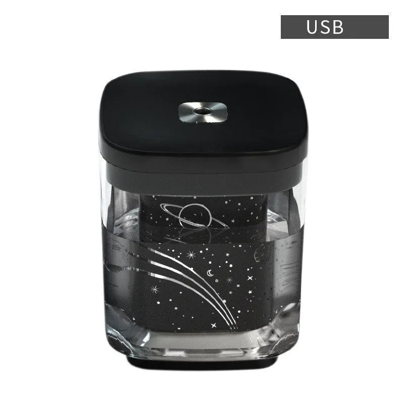 Square USB projection humidifier night light with aromatherapy in white colour on a wooden desktop