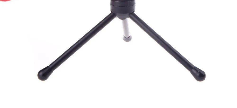 Black wired PC microphone with clip-on holder and long cable for chatting or karaoke.