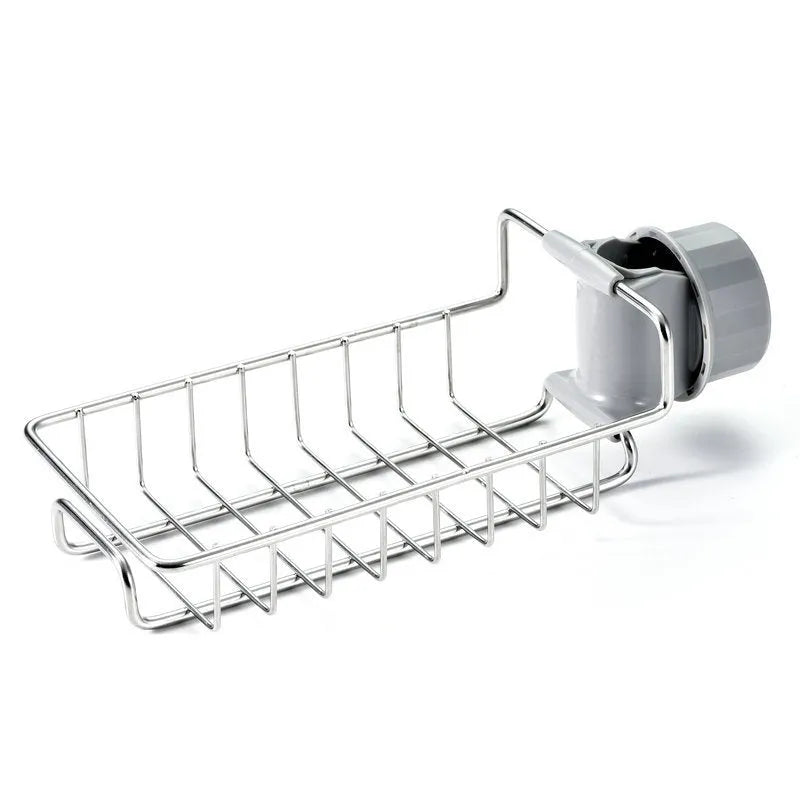 Adjustable stainless steel sink drain rack clipped onto a kitchen faucet with sponge and soap stored on the removable holder