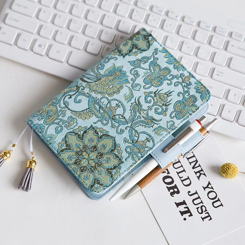 Blue floral fabric cover notebook shown in A5 and A6 sizes with core option selection