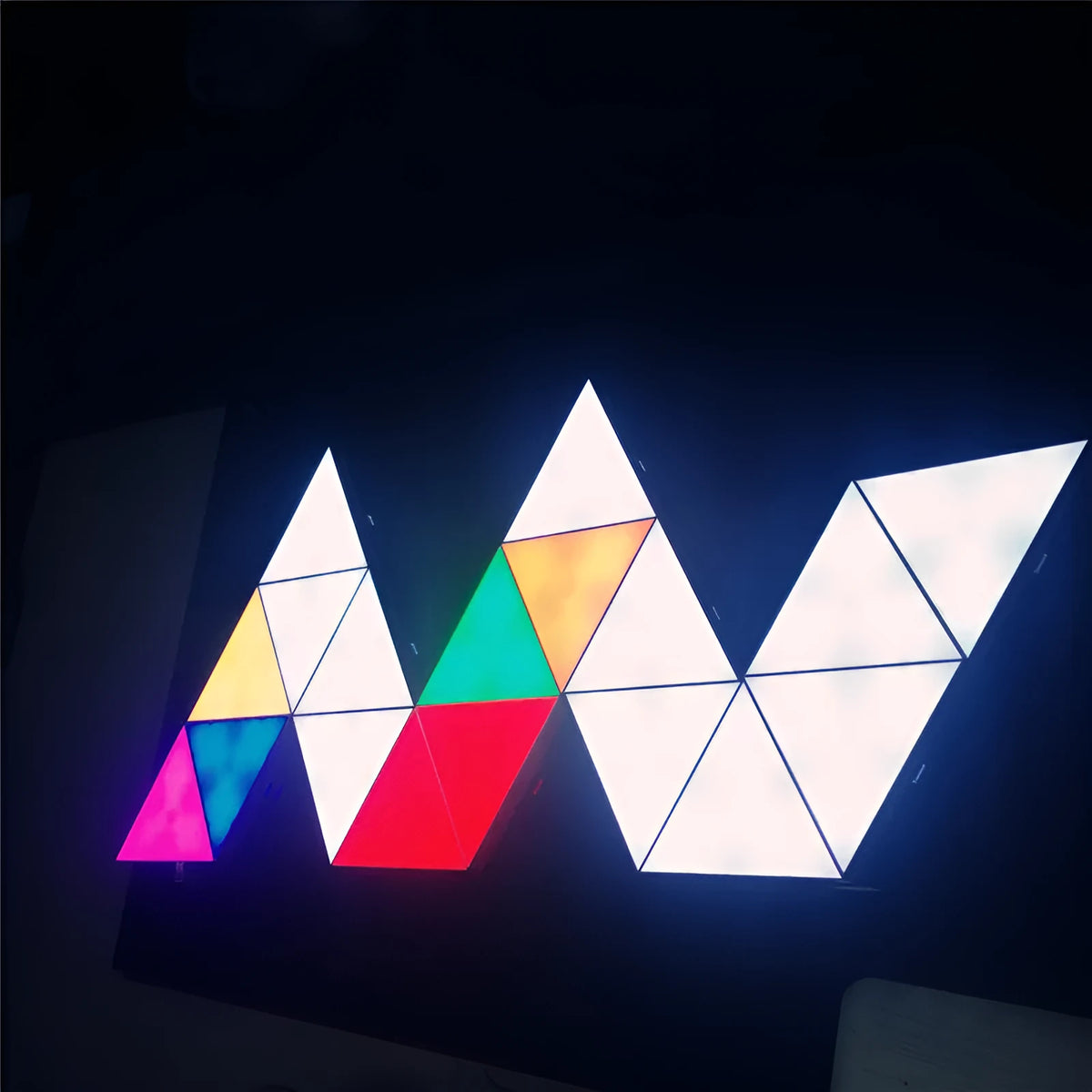 Six white triangle modular LED panels with RGB light, 15cm x 13cm x 2.8cm, free splicing design, APP controller and stickers