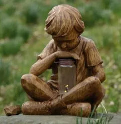 Brown natural resin tabletop statue of little boy figure for garden decoration