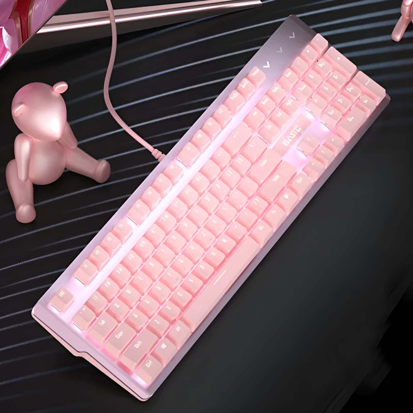 Pink wired mechanical keyboard and matching mouse set for PC desktop gaming.