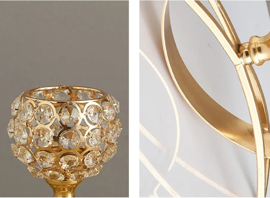 Gold crystal candle holder with geometric wrought iron frame on a table surface