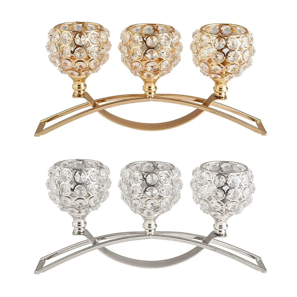 Gold crystal candle holder with geometric wrought iron frame on a table surface