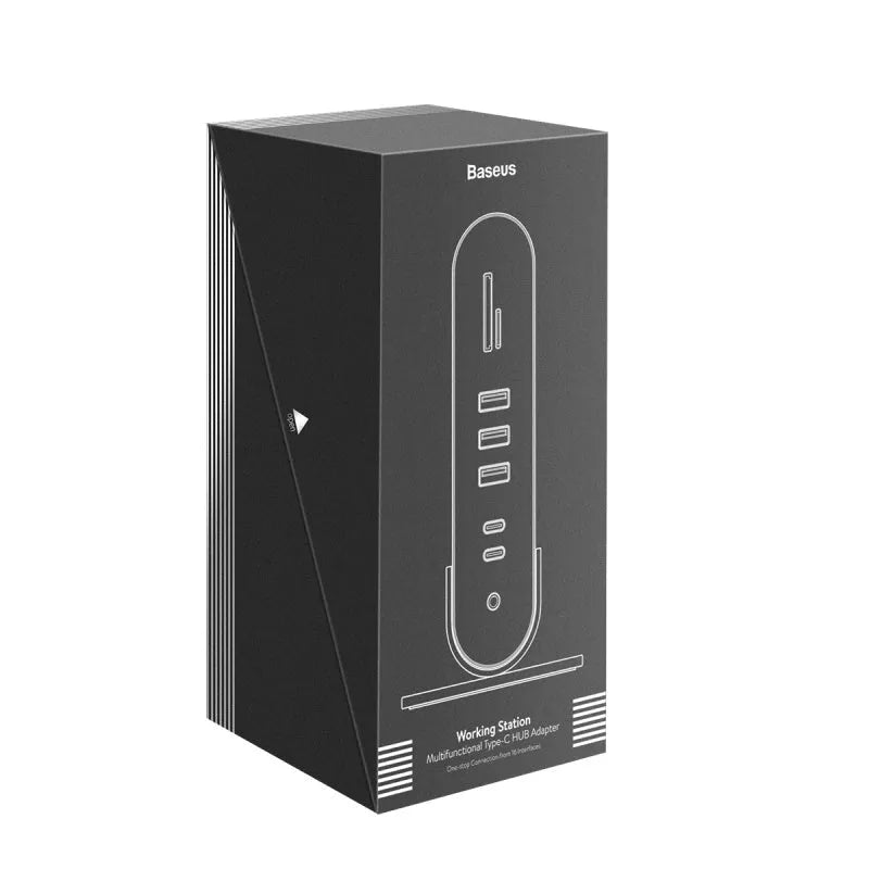 Deep space grey 16-in-1 USB-C docking station and power supply on a desk.