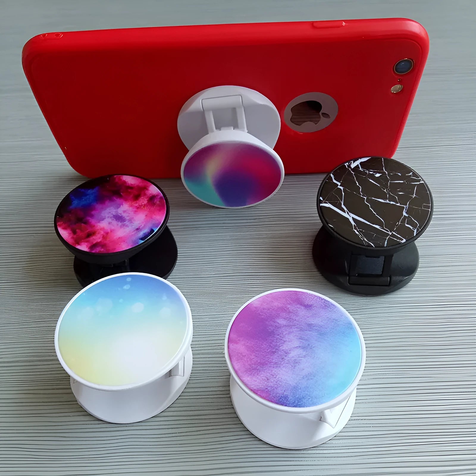 Thermal transfer creative folding mobile phone holder in desktop position showing universal design