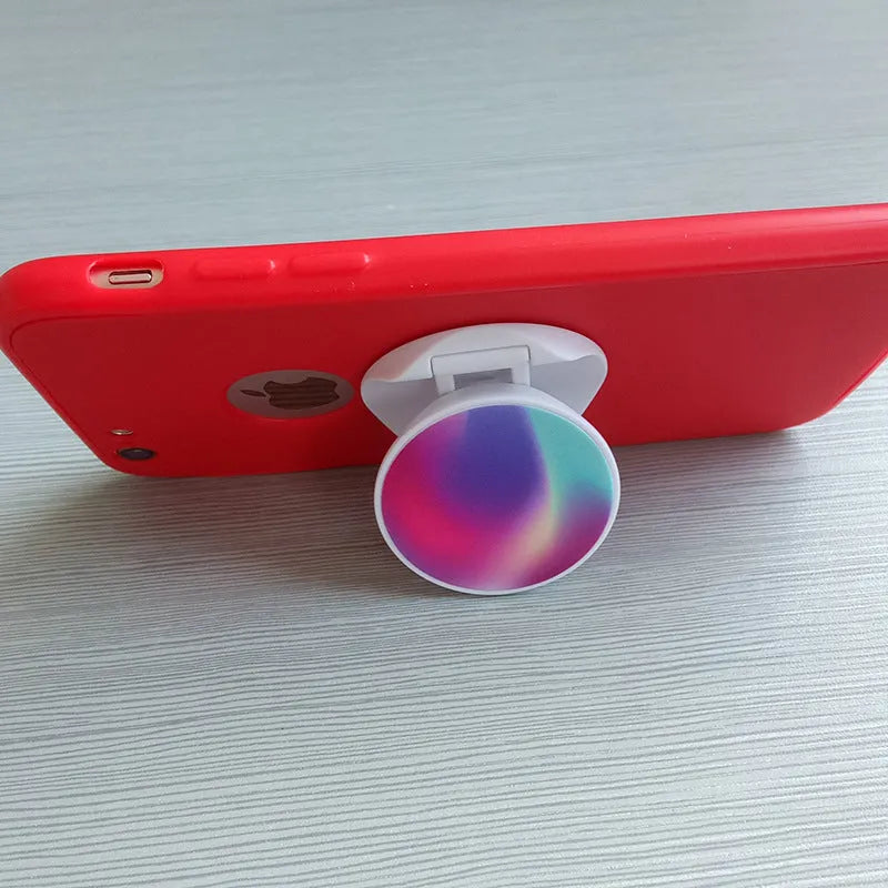 Thermal transfer creative folding mobile phone holder in desktop position showing universal design