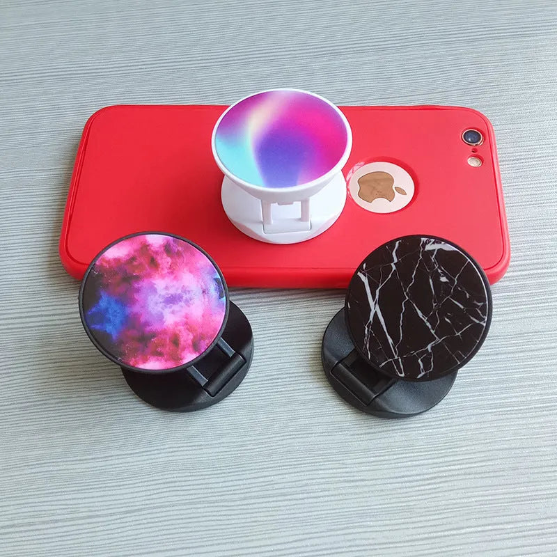 Thermal transfer creative folding mobile phone holder in desktop position showing universal design