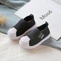 Children's striped casual sneakers with a soft PVC sole, shown in yellow, for toddler and kids sizes.