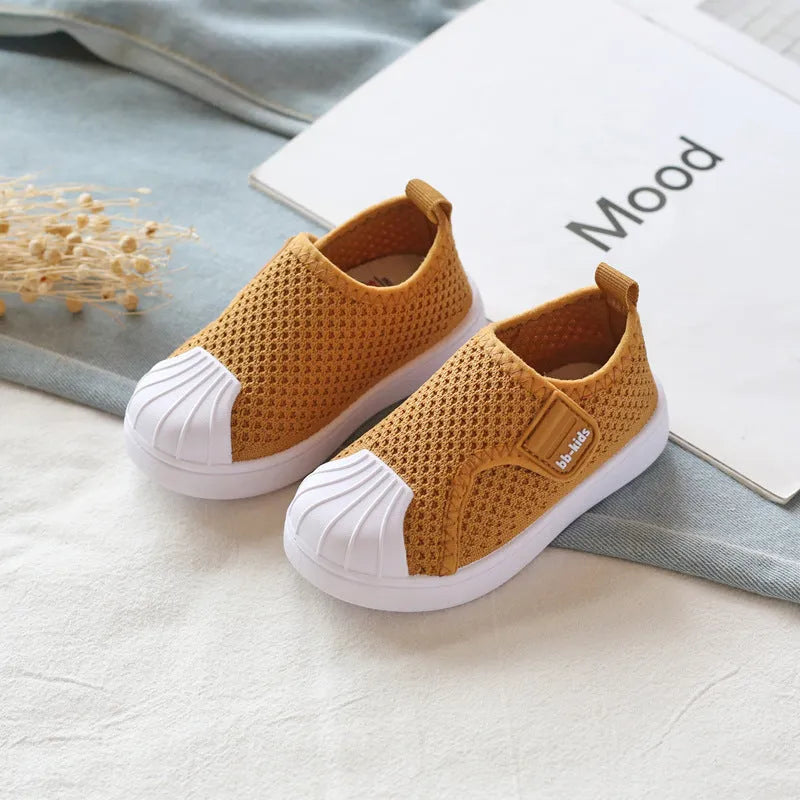 Children's striped casual sneakers with a soft PVC sole, shown in yellow, for toddler and kids sizes.