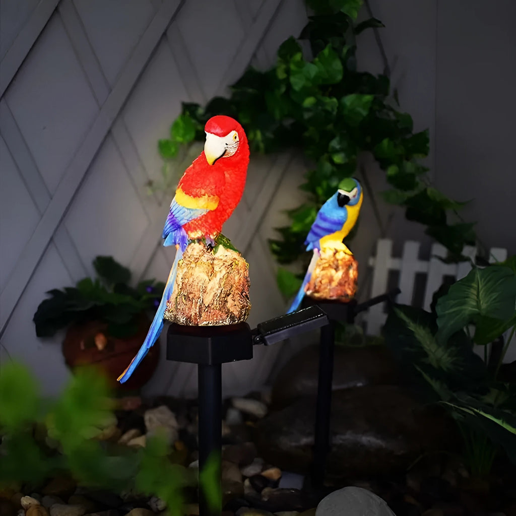 Hand-painted resin parrot solar light in blue with LED illumination for garden lawn decoration