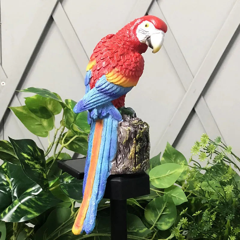 Hand-painted resin parrot solar light in blue with LED illumination for garden lawn decoration