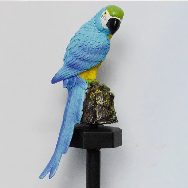 Hand-painted resin parrot solar light in blue with LED illumination for garden lawn decoration