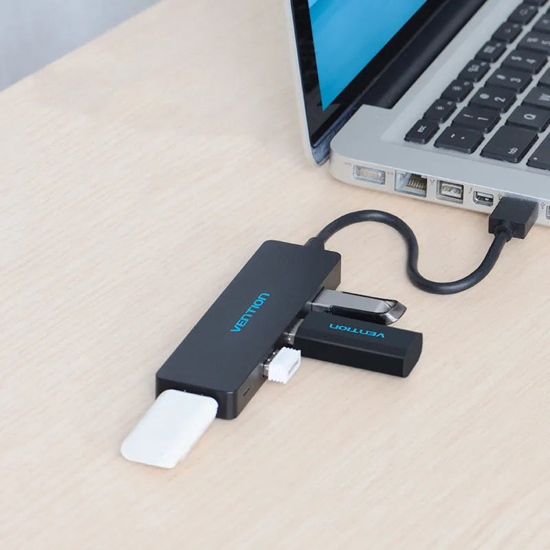 Black USB 3.0 four-port hub with 0.15 m cable and nickel-plated ports