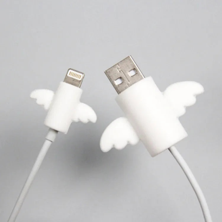 White and black silicone cable protective covers shown next to a charging cable.