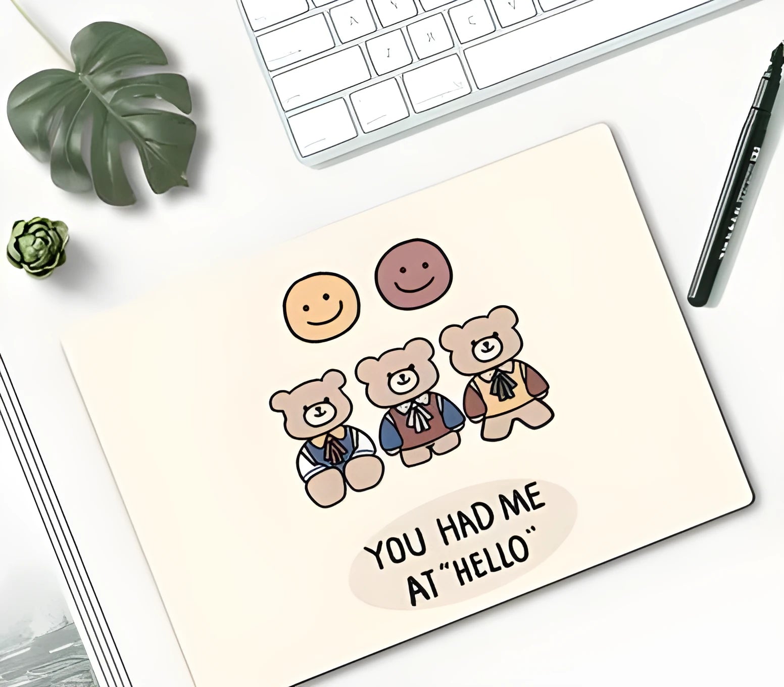 Small cartoon girl design mouse pad with wind-shaped edges on a desk