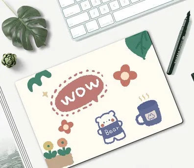Small cartoon girl design mouse pad with wind-shaped edges on a desk