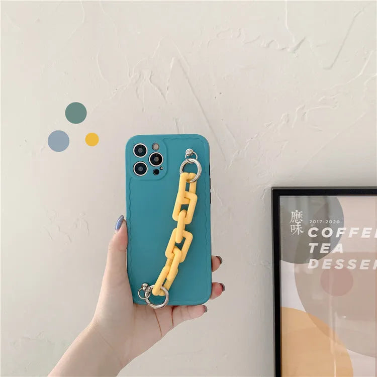 Huawei and iPhone phone case with matching chain strap in candy colours like pink and blue