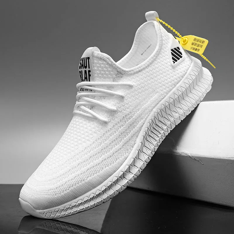 Men's mesh running shoes in black with flying weave upper and white EVA sole on grey background