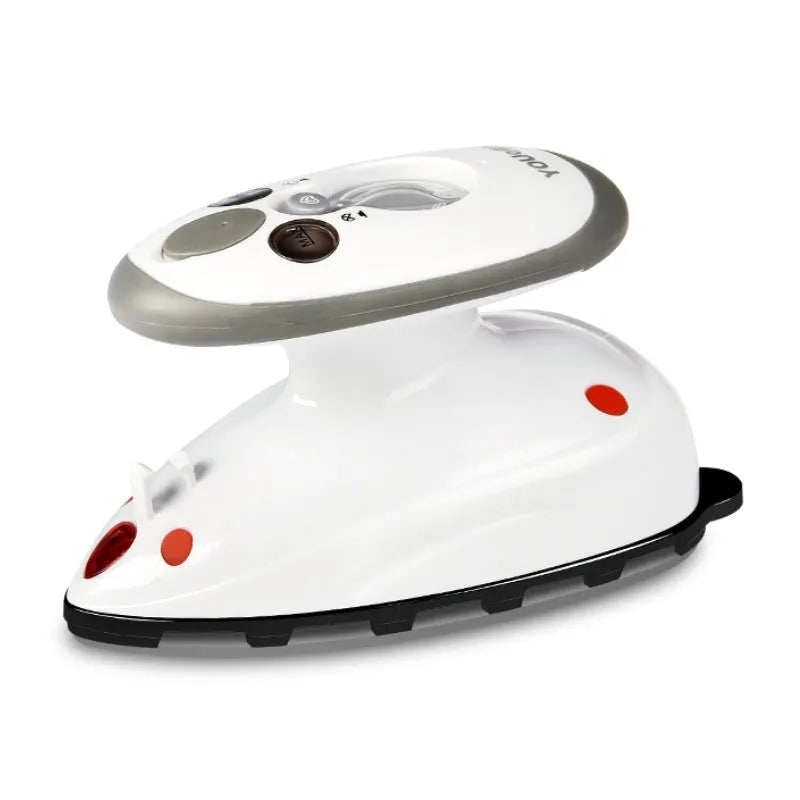 Mini portable steam iron with ceramic soleplate in alpine white on a white background