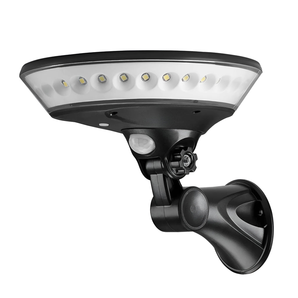 White 360-degree solar powered security light with motion sensor mounted on an outdoor wall.