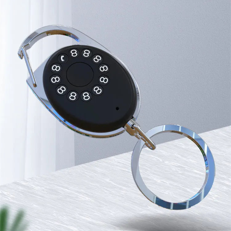 Black Bluetooth anti-lost tracker and selfie remote keychain compatible with Apple iPhone.