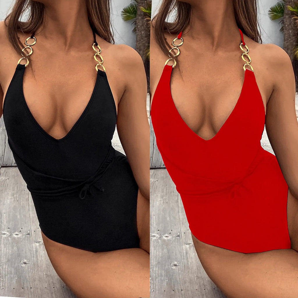 Ladies one-piece swimsuit in solid colour nylon with chest pad, shown in red or black, sizes S M L