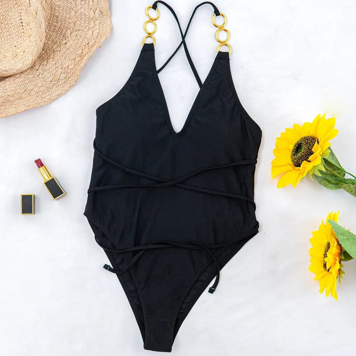 Ladies one-piece swimsuit in solid colour nylon with chest pad, shown in red or black, sizes S M L