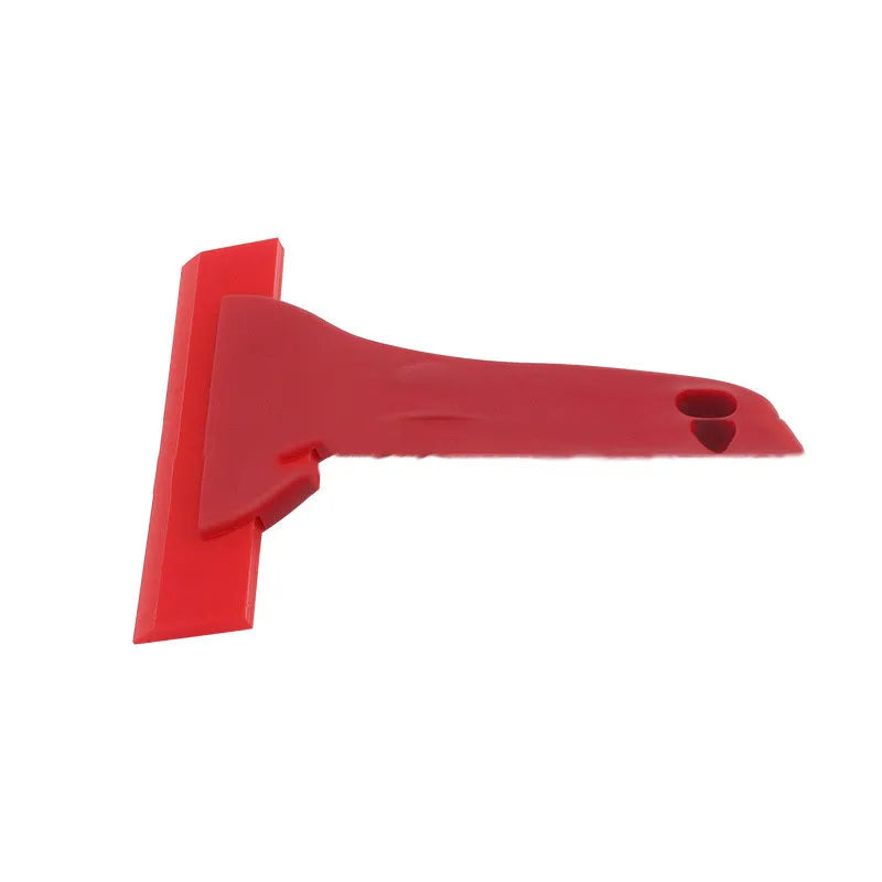 Red car film wiper tool with polyurethane head and PP handle on white background