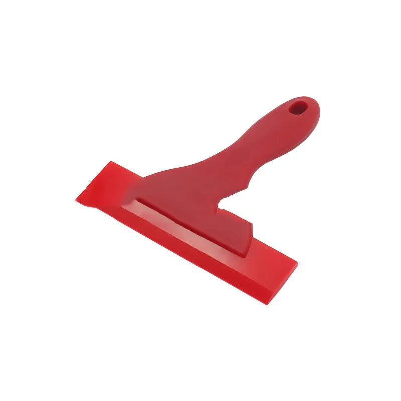Red car film wiper tool with polyurethane head and PP handle on white background