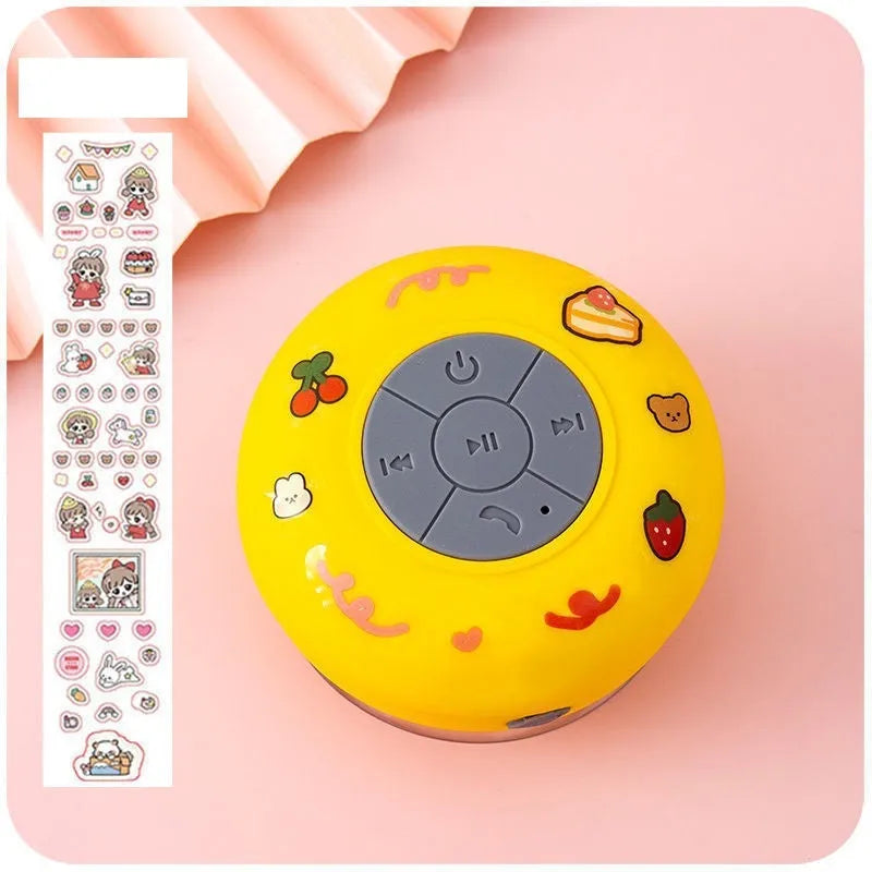 Waterproof Bluetooth mini speaker with silicone suction cup in black, blue, pink, white, or yellow colours
