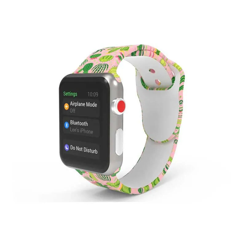 Colourful tie-dye patterned silicone replacement band for Apple Watch on a wrist.