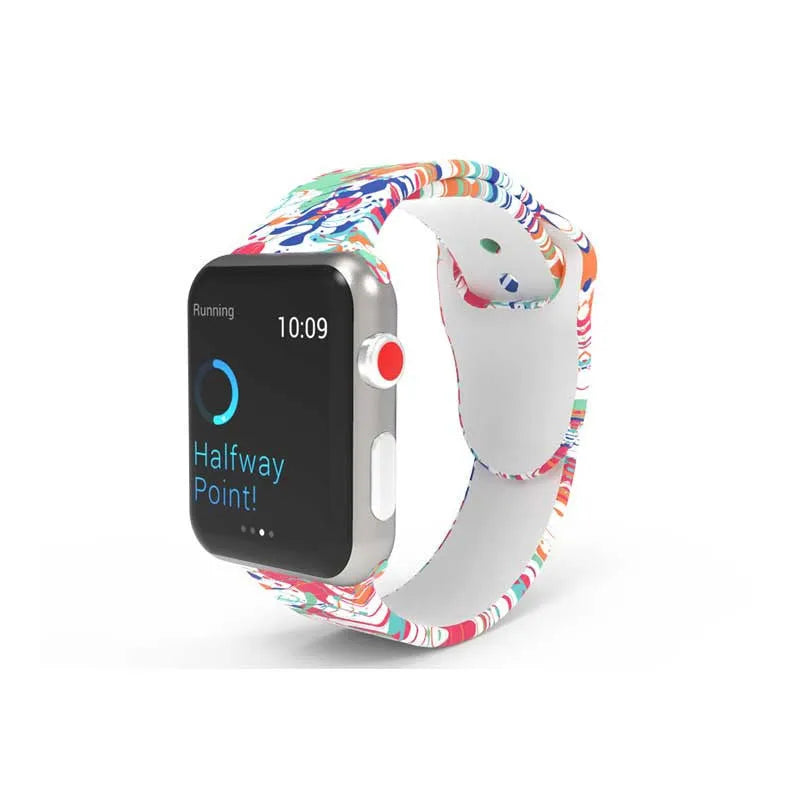 Colourful tie-dye patterned silicone replacement band for Apple Watch on a wrist.
