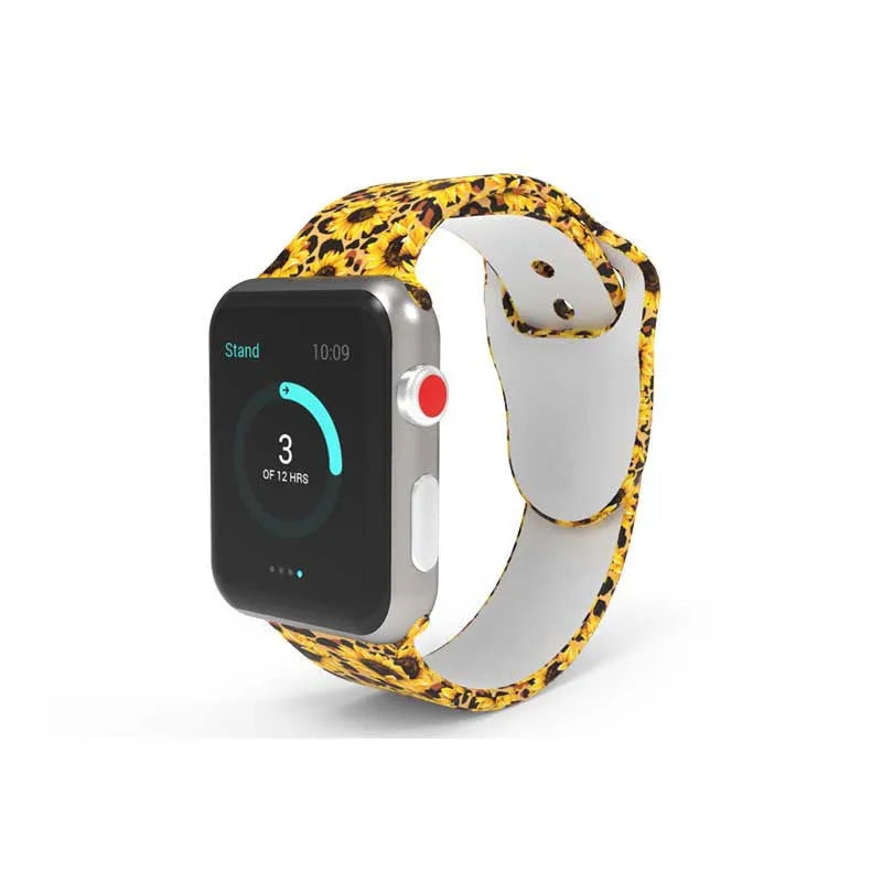 Colourful tie-dye patterned silicone replacement band for Apple Watch on a wrist.