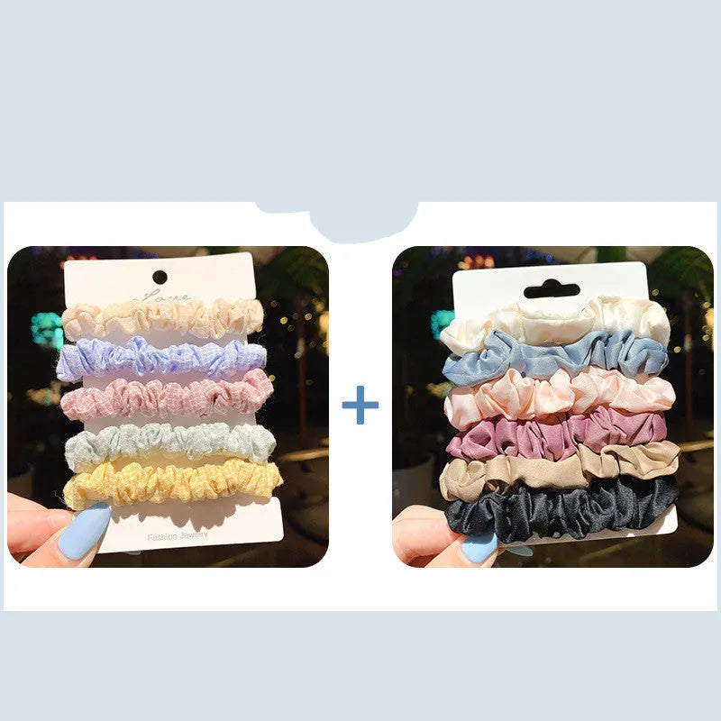 Set of children's hair rings and a head rope in assorted autumn and pastel colours.