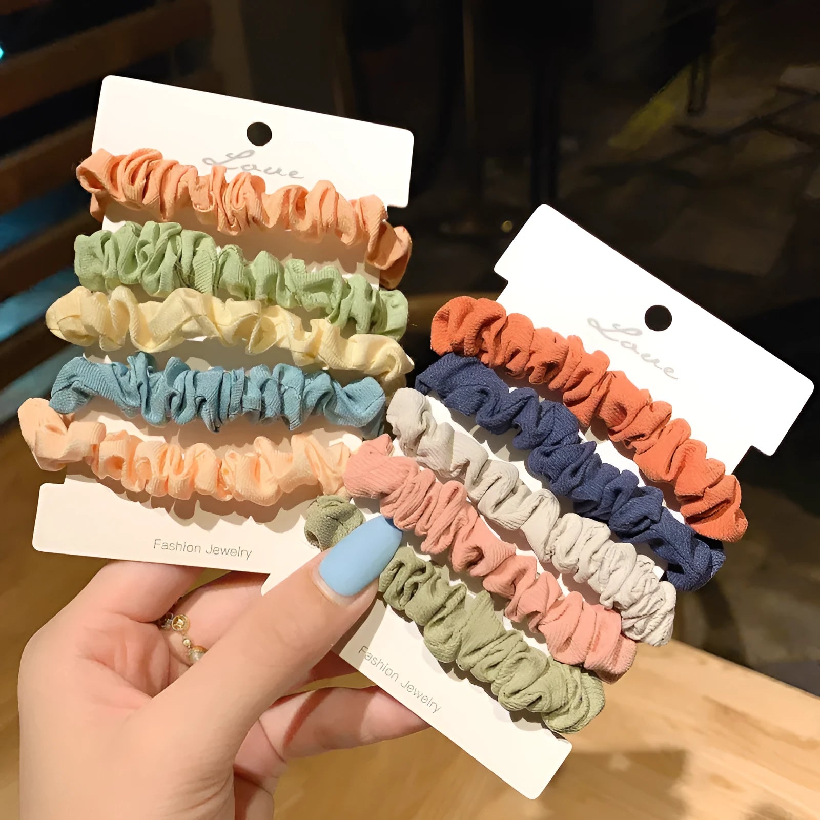 Set of children's hair rings and a head rope in assorted autumn and pastel colours.
