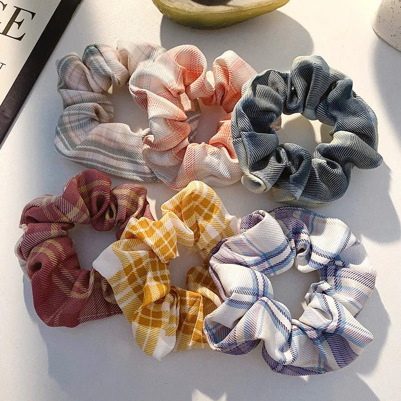 Set of children's hair rings and a head rope in assorted autumn and pastel colours.