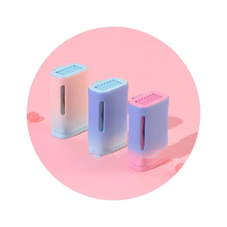 Jelly USB hanging neck and handheld mini fan in mint peach colour showing compact size.