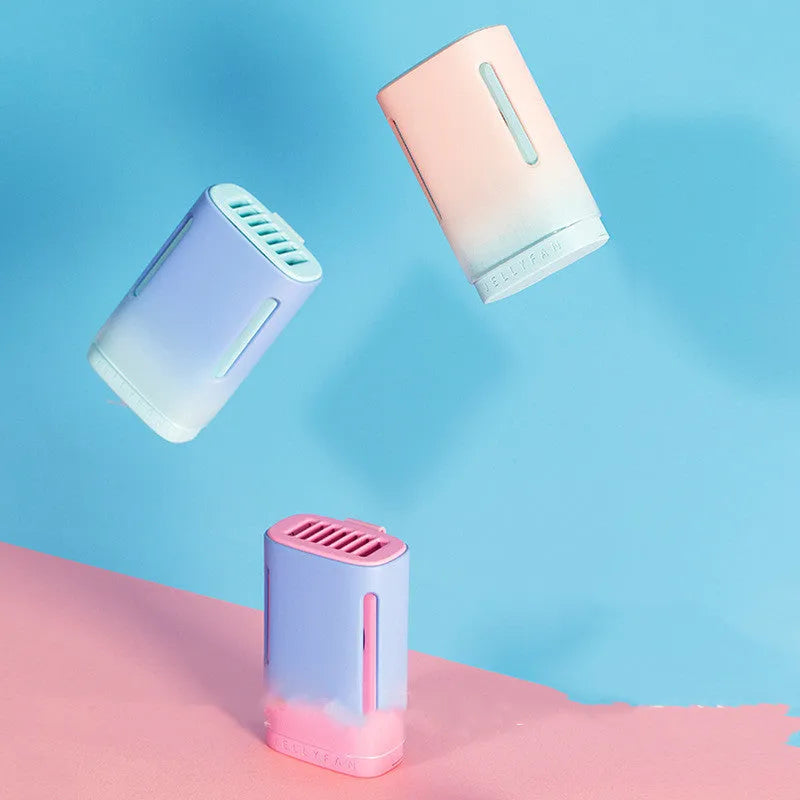 Jelly USB hanging neck and handheld mini fan in mint peach colour showing compact size.