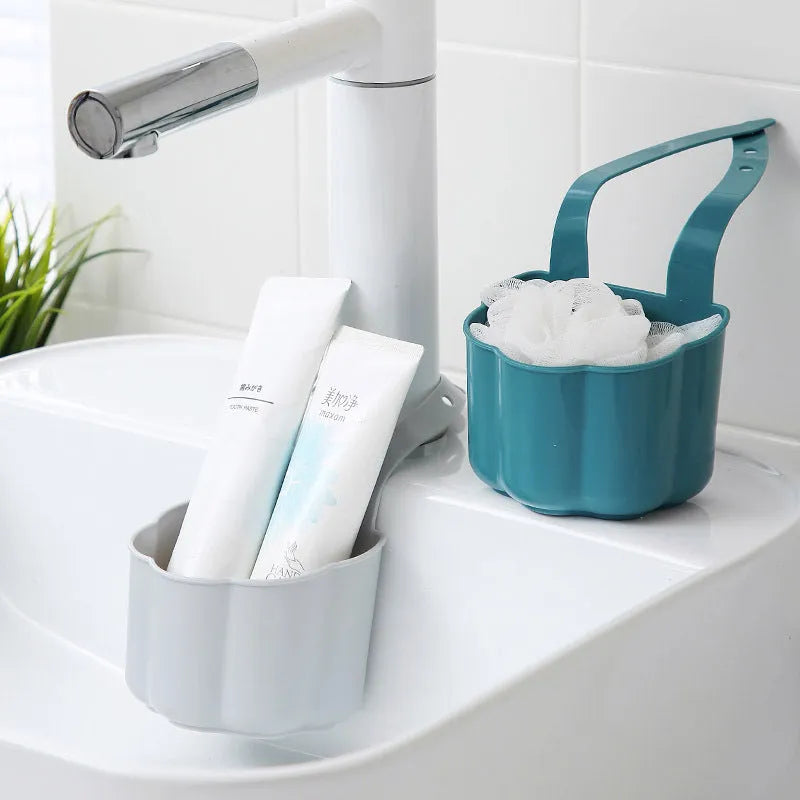 Plastic kitchen sink drain basket in dark blue colour showing Nordic style design.