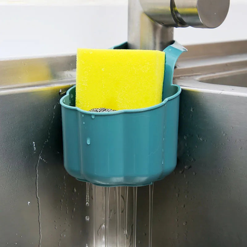 Plastic kitchen sink drain basket in dark blue colour showing Nordic style design.