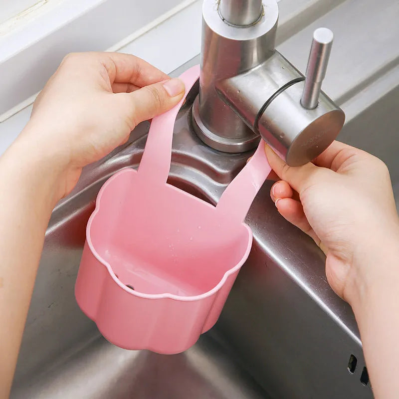 Plastic kitchen sink drain basket in dark blue colour showing Nordic style design.