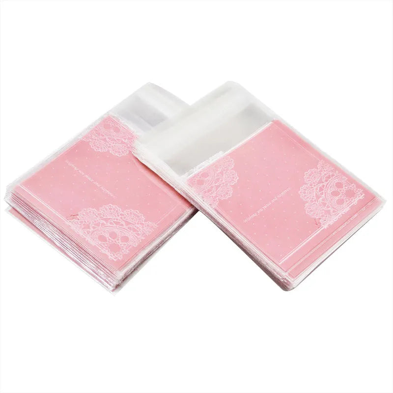 Clear self-adhesive plastic bag for handmade soap with pink UV printing and a 3cm side gusset.