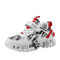 Boys' sports sneakers with Velcro straps in beige blue, white red, and bright red colour options.