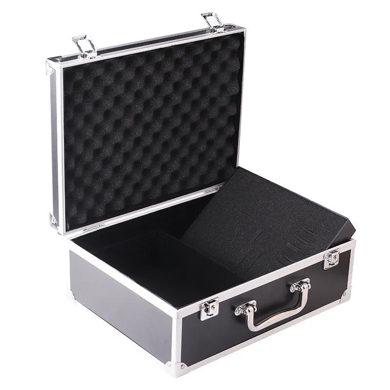 Black aluminium tattoo storage box open, showing removable plastic trays, machine stand in lid, and ink bottle slots.